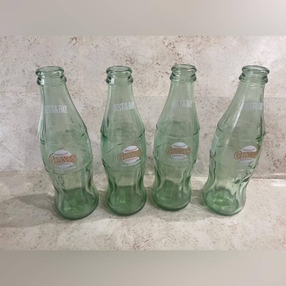 Coca Cola set of 4 bottles -8oz- best of the bay
